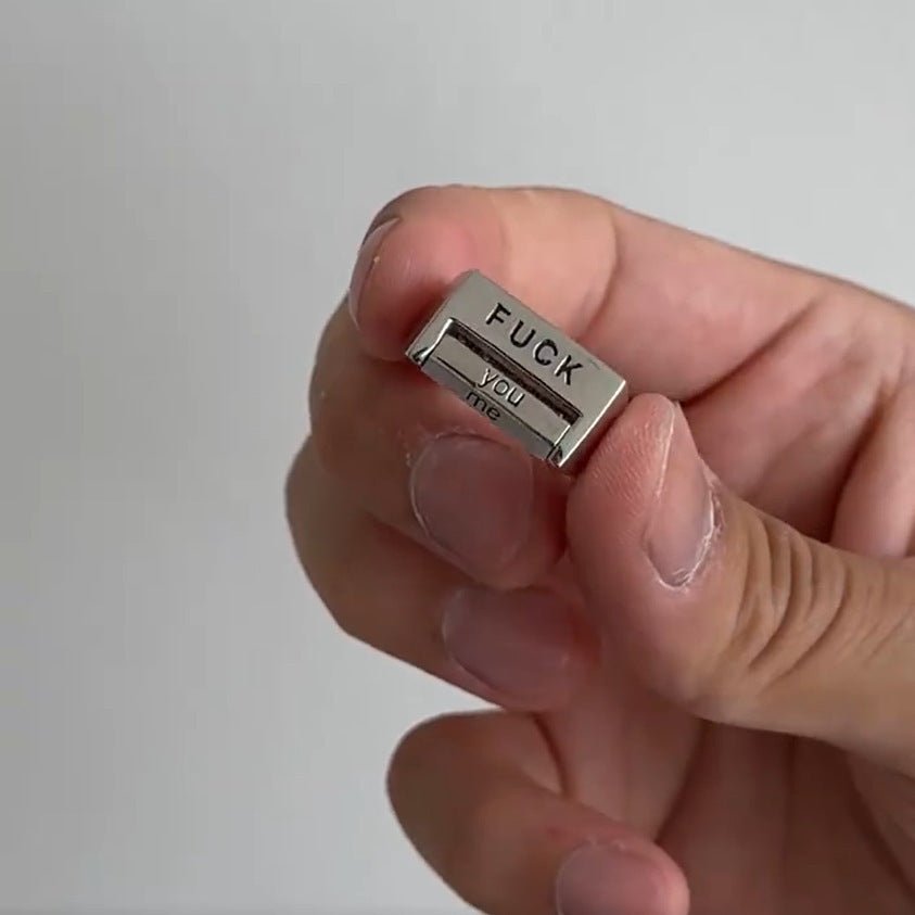 “Against Everything” Rotating Ring