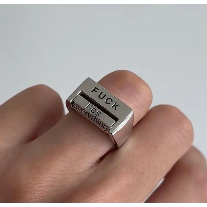 “Against Everything” Rotating Ring