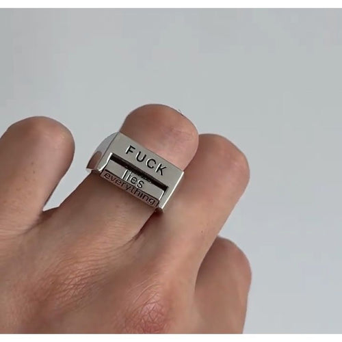 “Against Everything” Rotating Ring